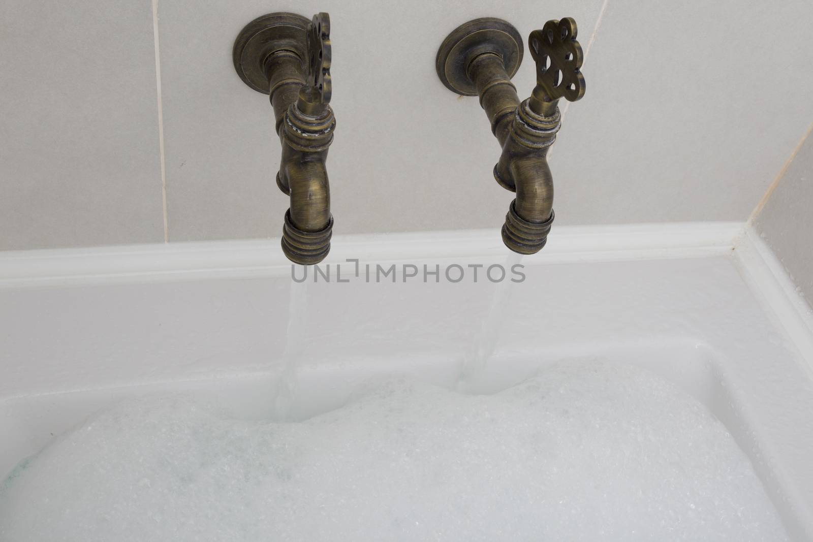 an old fashioned bathroom with bath