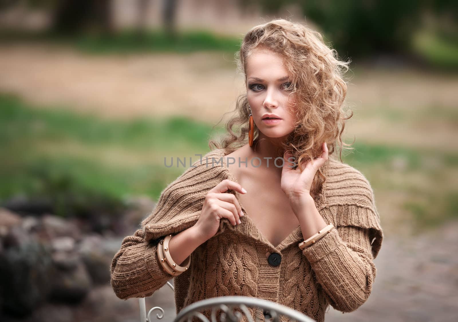 young beautiful woman is resting in the garden