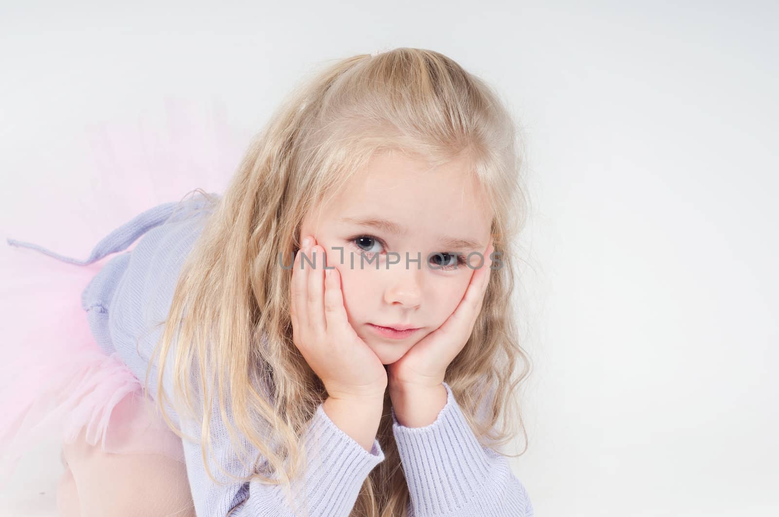 Studio shot of ballet dancer girl in blue