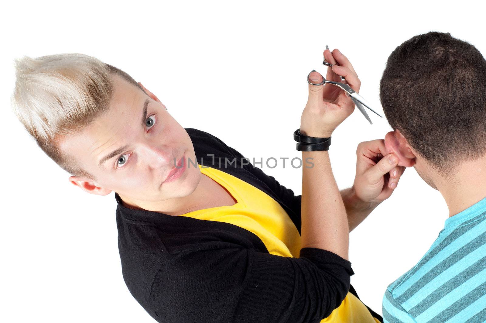 HandsHairdresser working with scissors, studio shooting on whiteome man