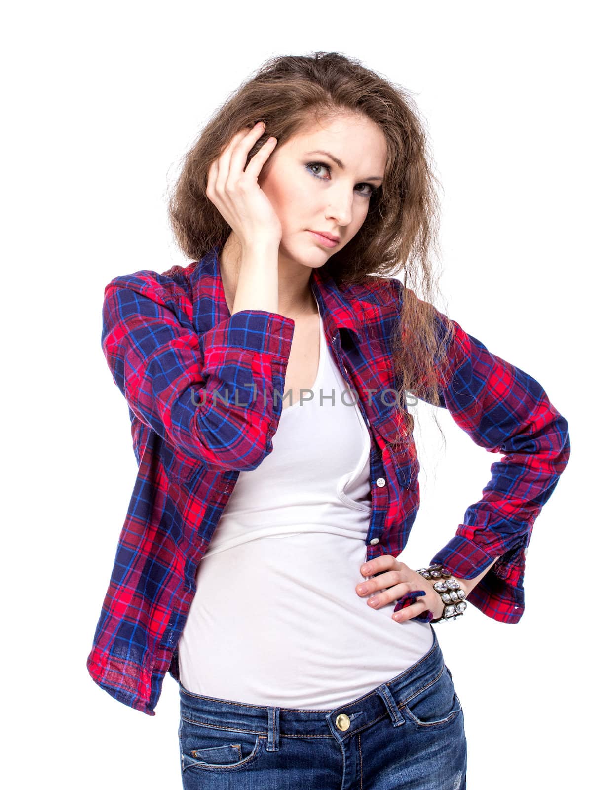 Attractive young woman in a checkered shirt, isolated