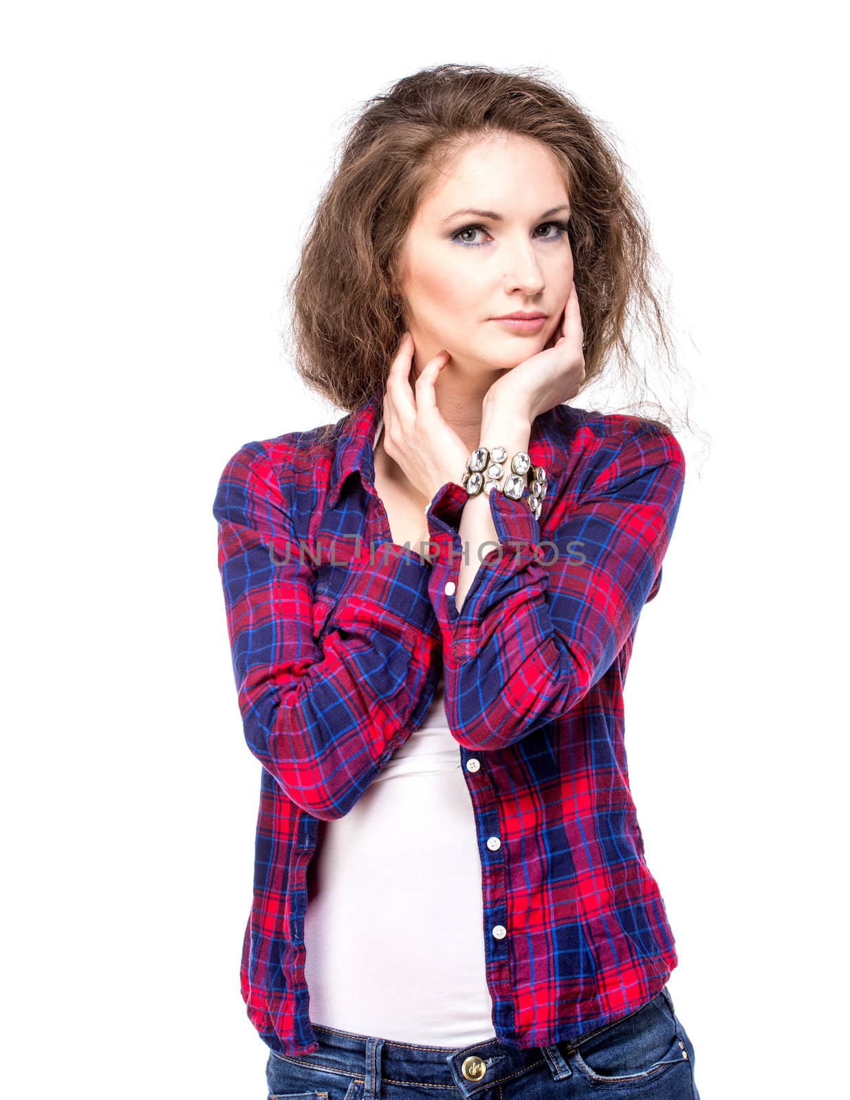 Attractive young woman in a checkered shirt, isolated