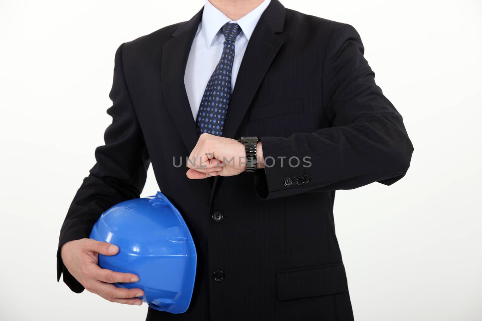 Entrepreneur looking at his watch