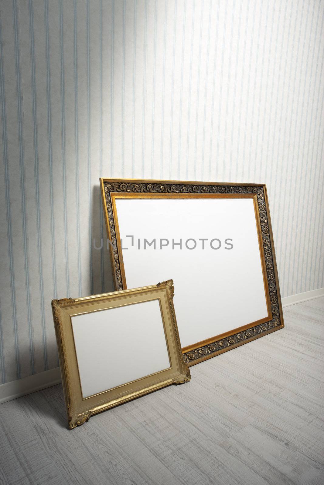 Two Baroque frames in a empty room