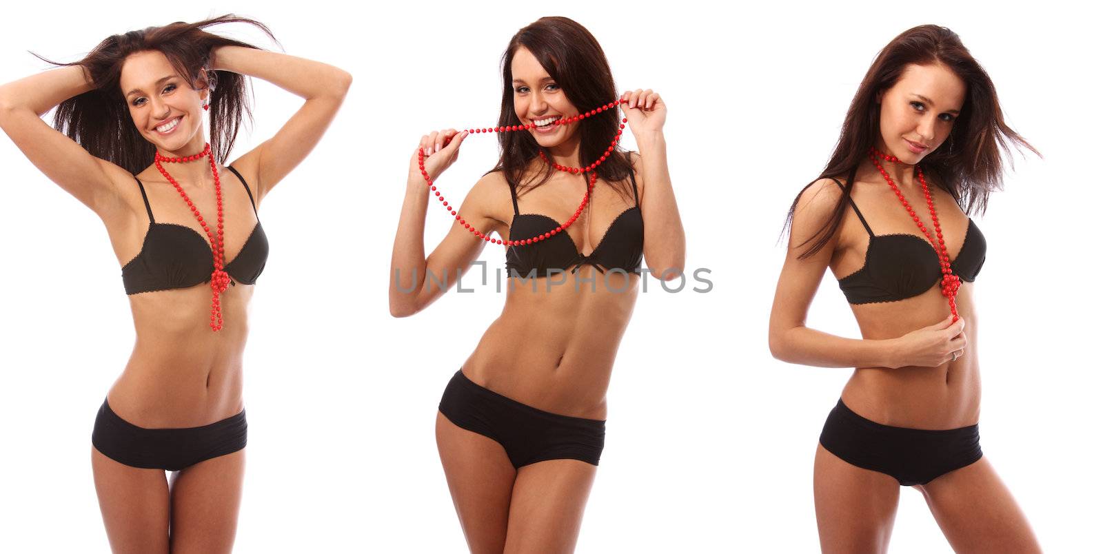Sexy brunette holds a red beads in hands