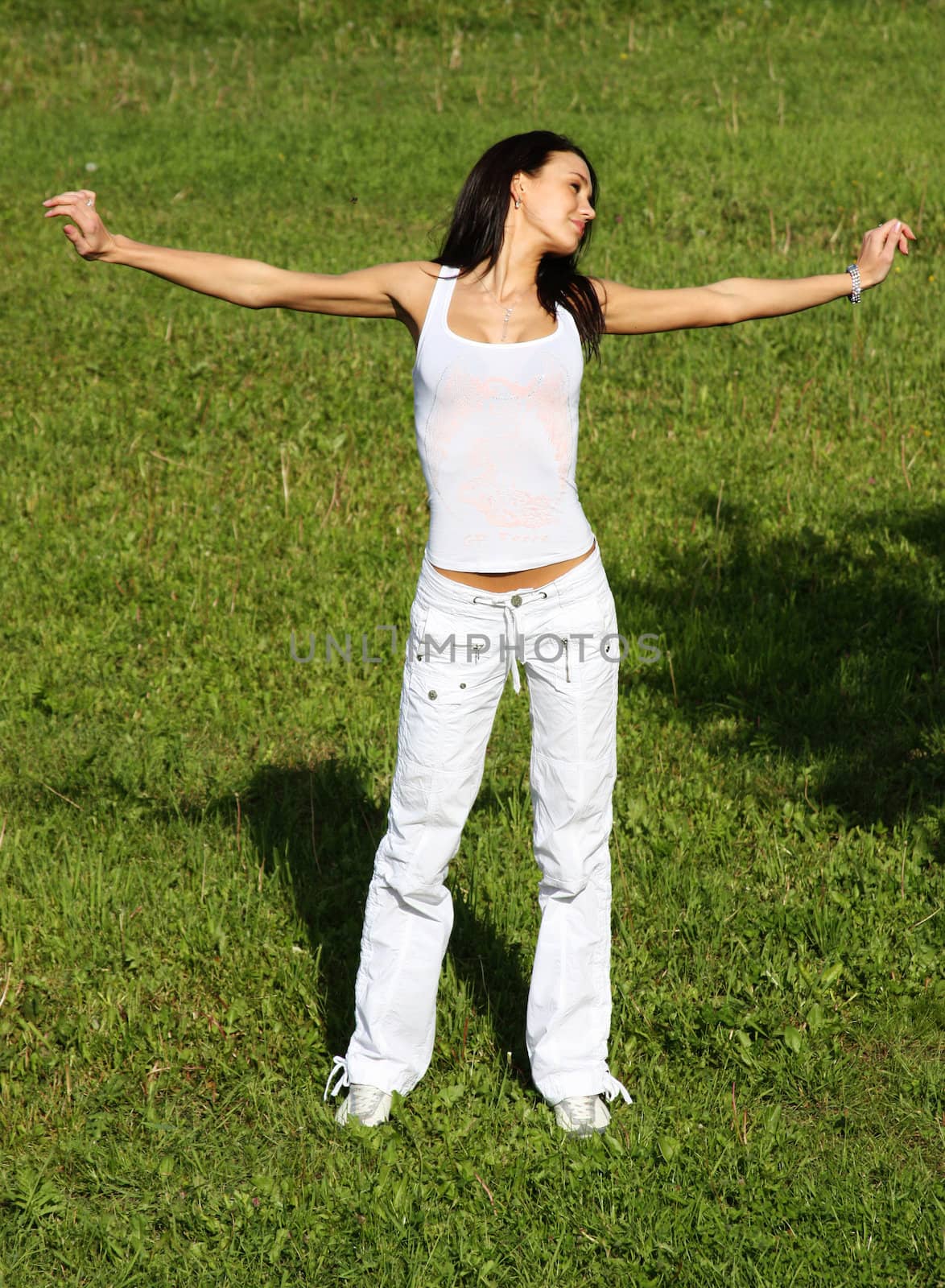 Fitness young woman in white