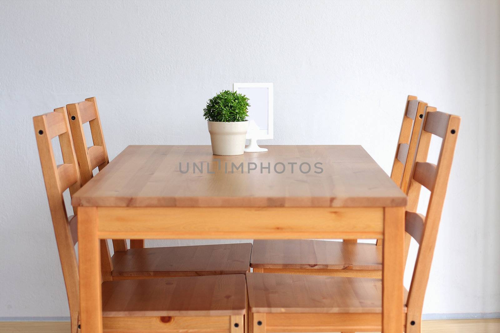 Wooden dining table for 4.