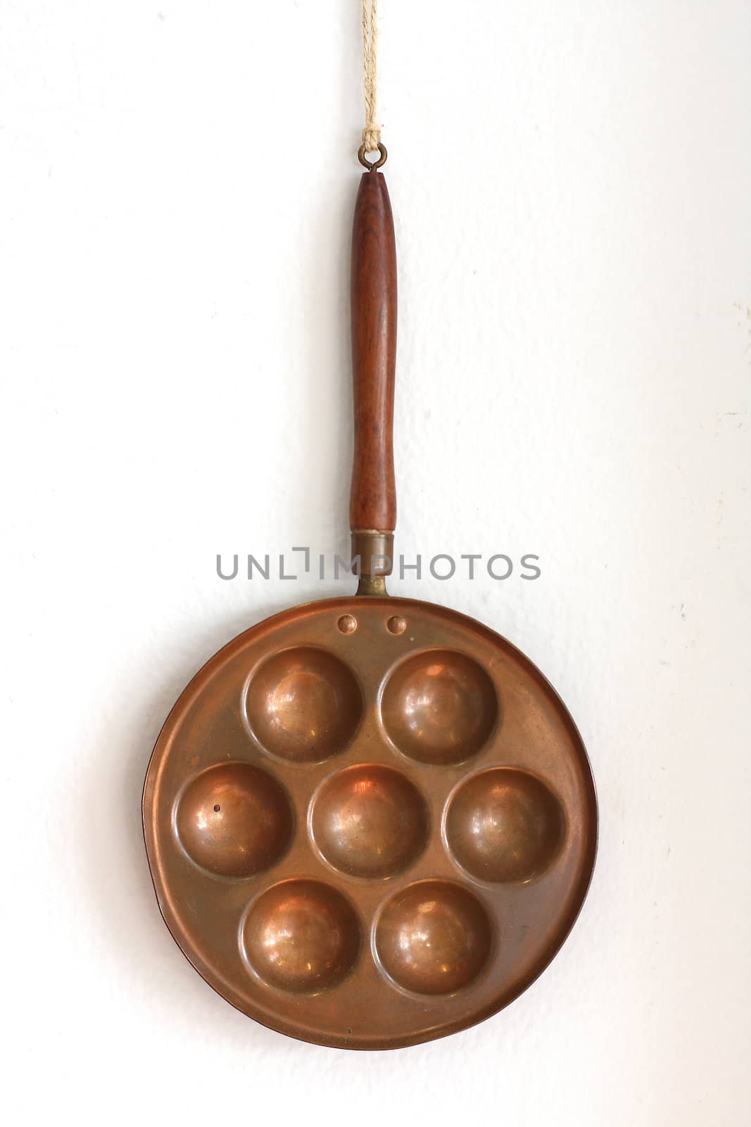 Pan fried quail eggs on white background by myrainjom01