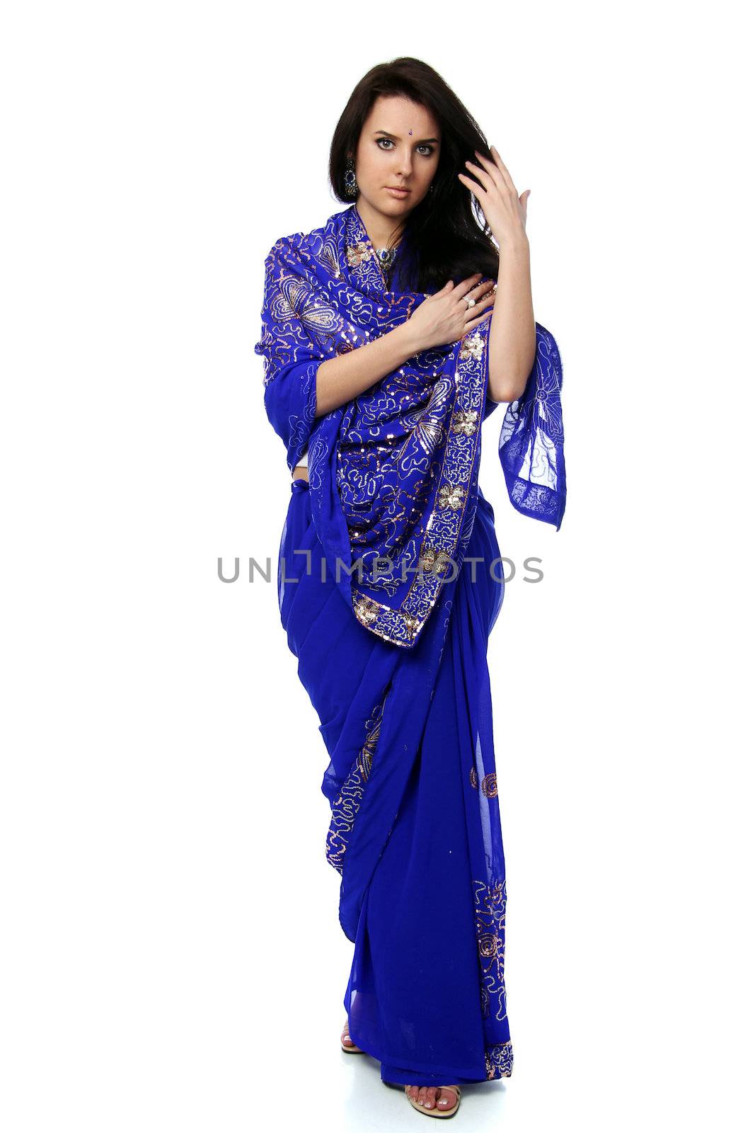Young pretty woman in indian sari dress by andersonrise