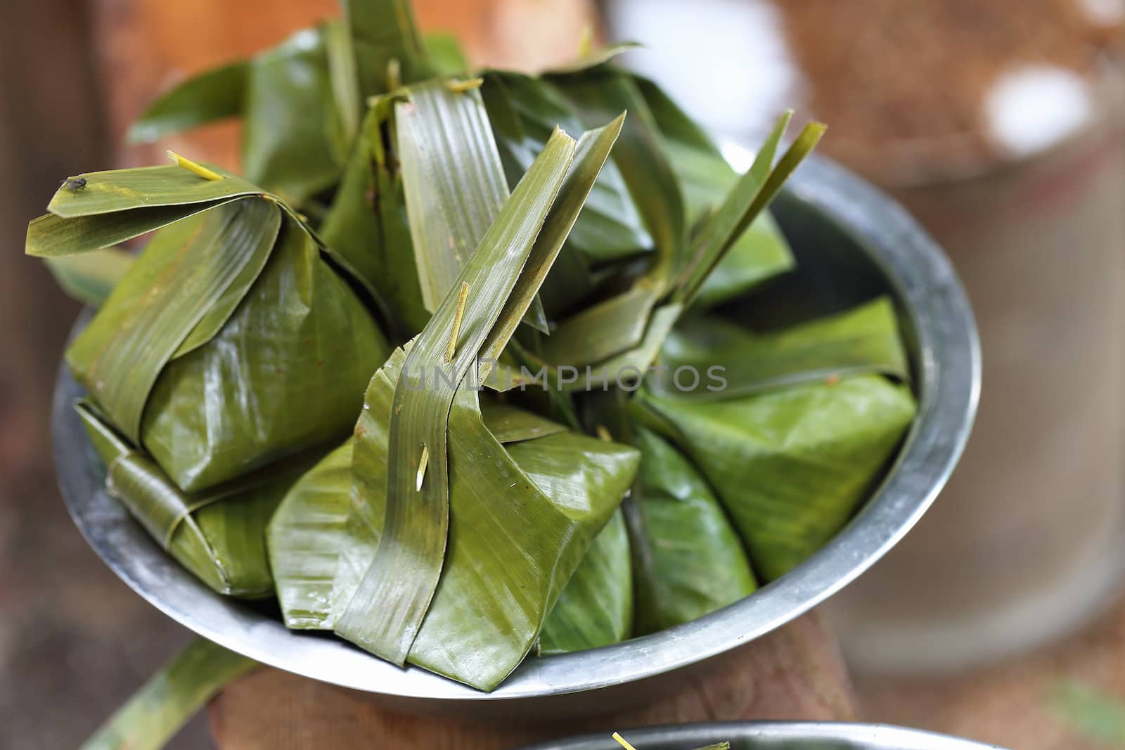 Sweets wrapped in banana leaves. by myrainjom01