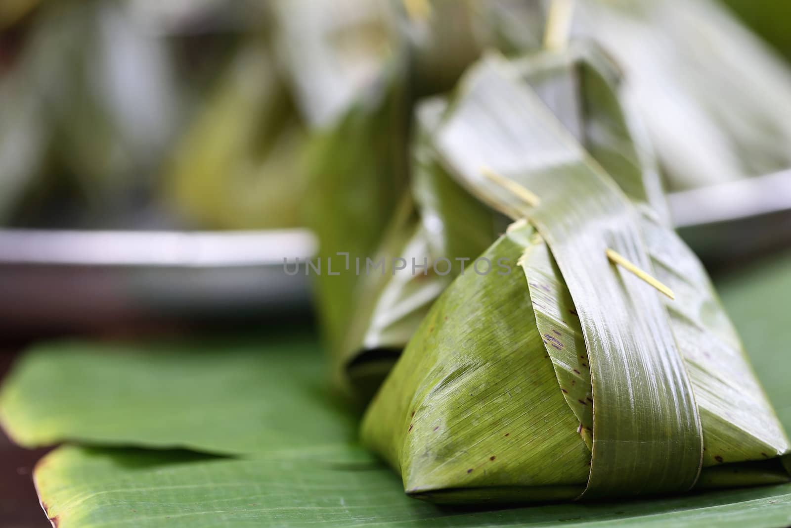 Sweets wrapped in banana leaves.