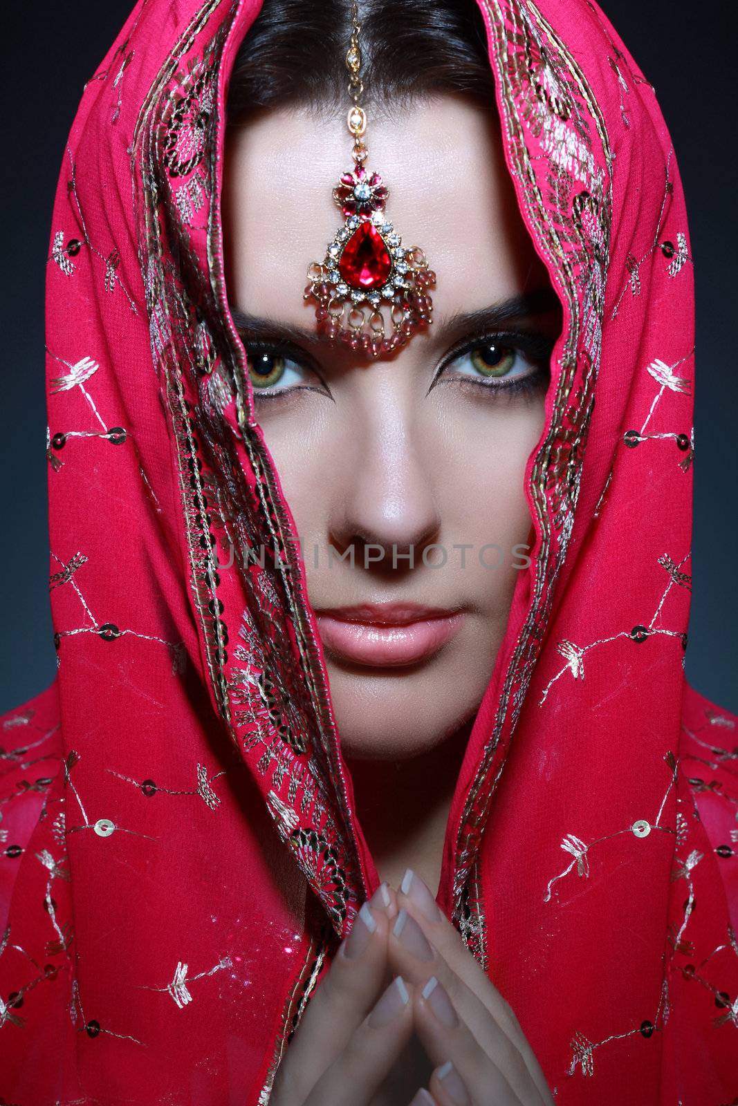 young pretty woman in indian red sari