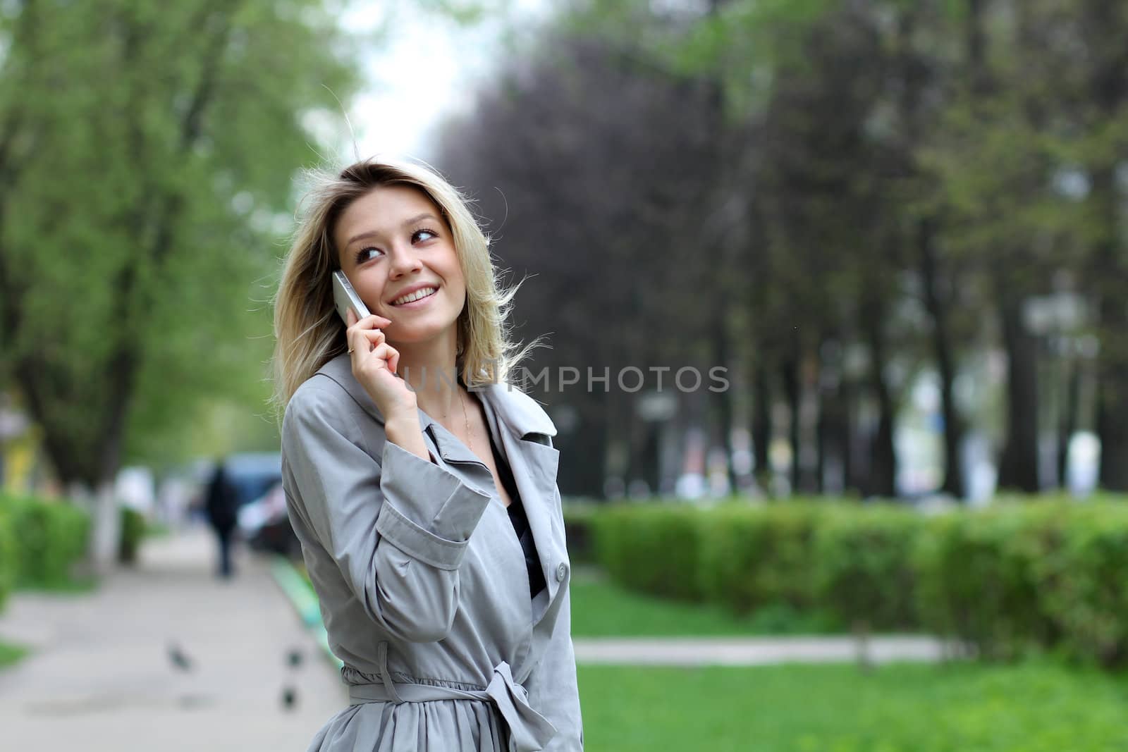 portrait of young woman talking on mobile phone