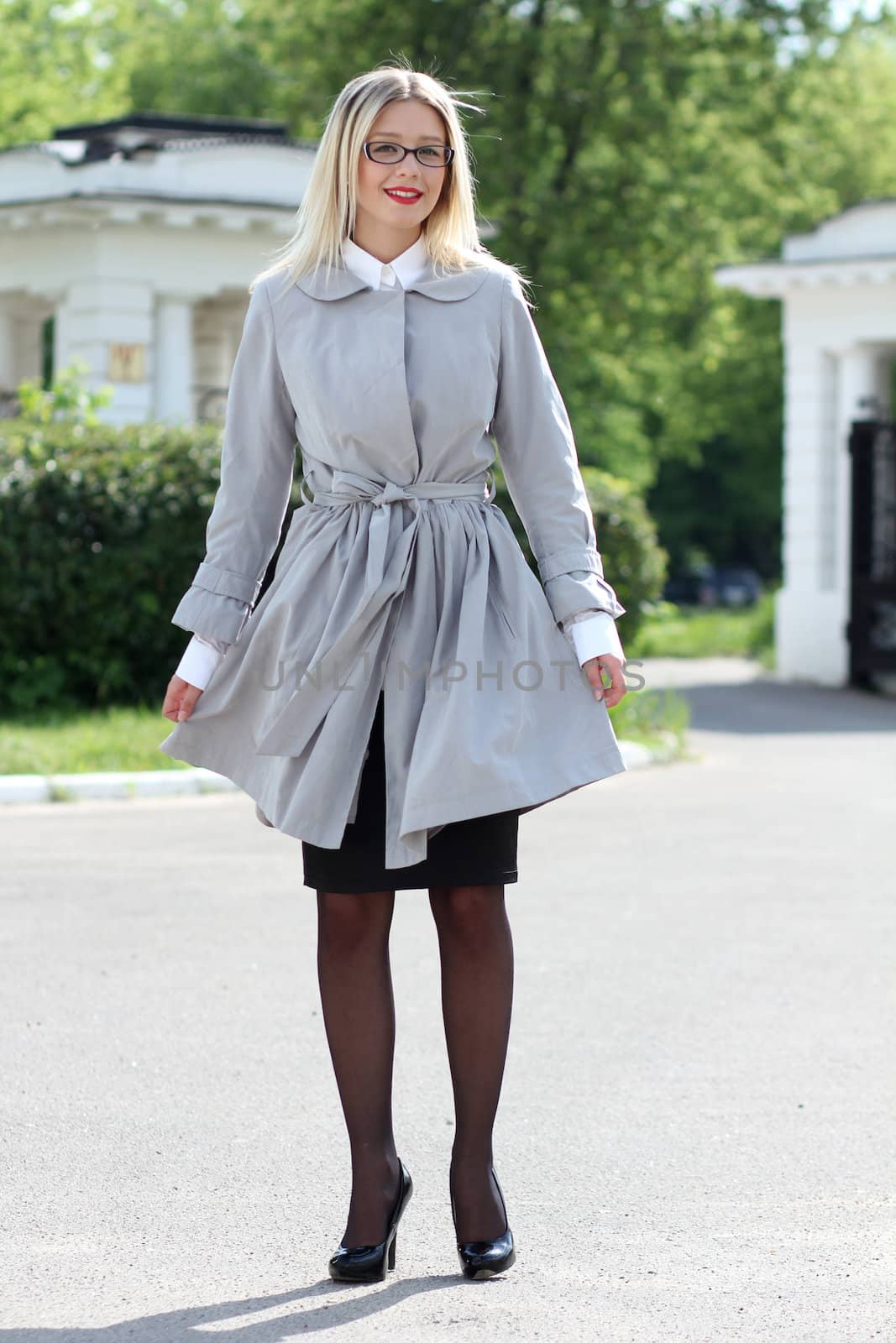 beautiful young woman walking on the street