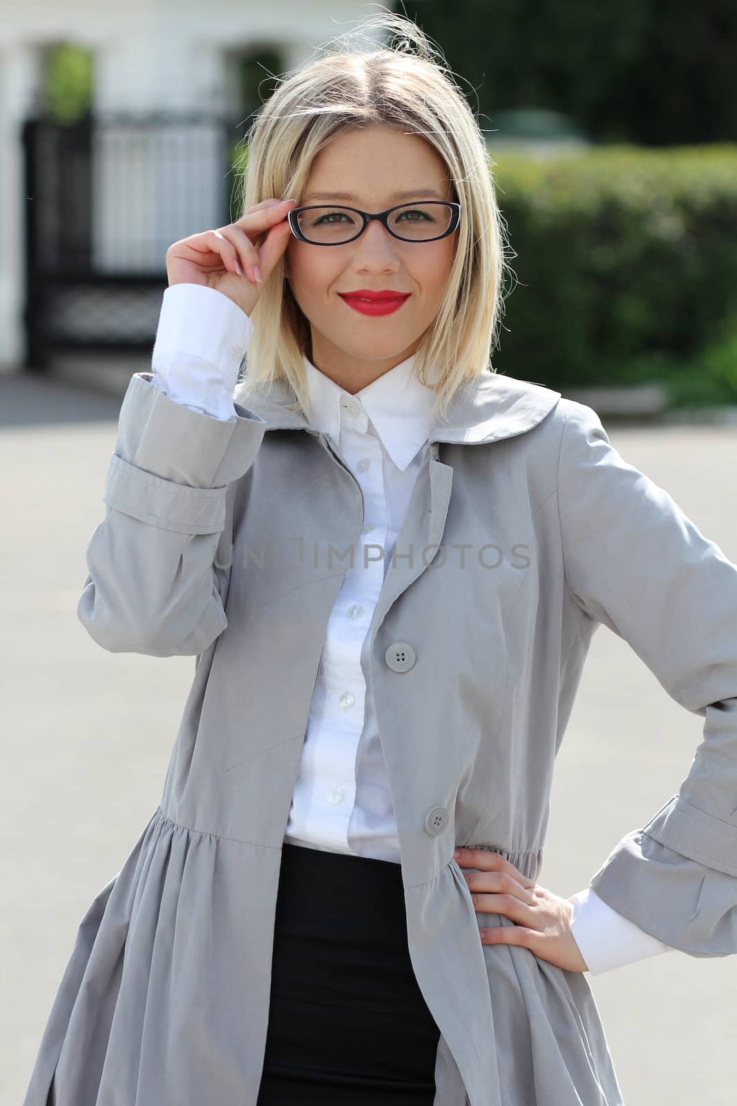 Beautiful young woman in sunglasses. Outdoor portrait