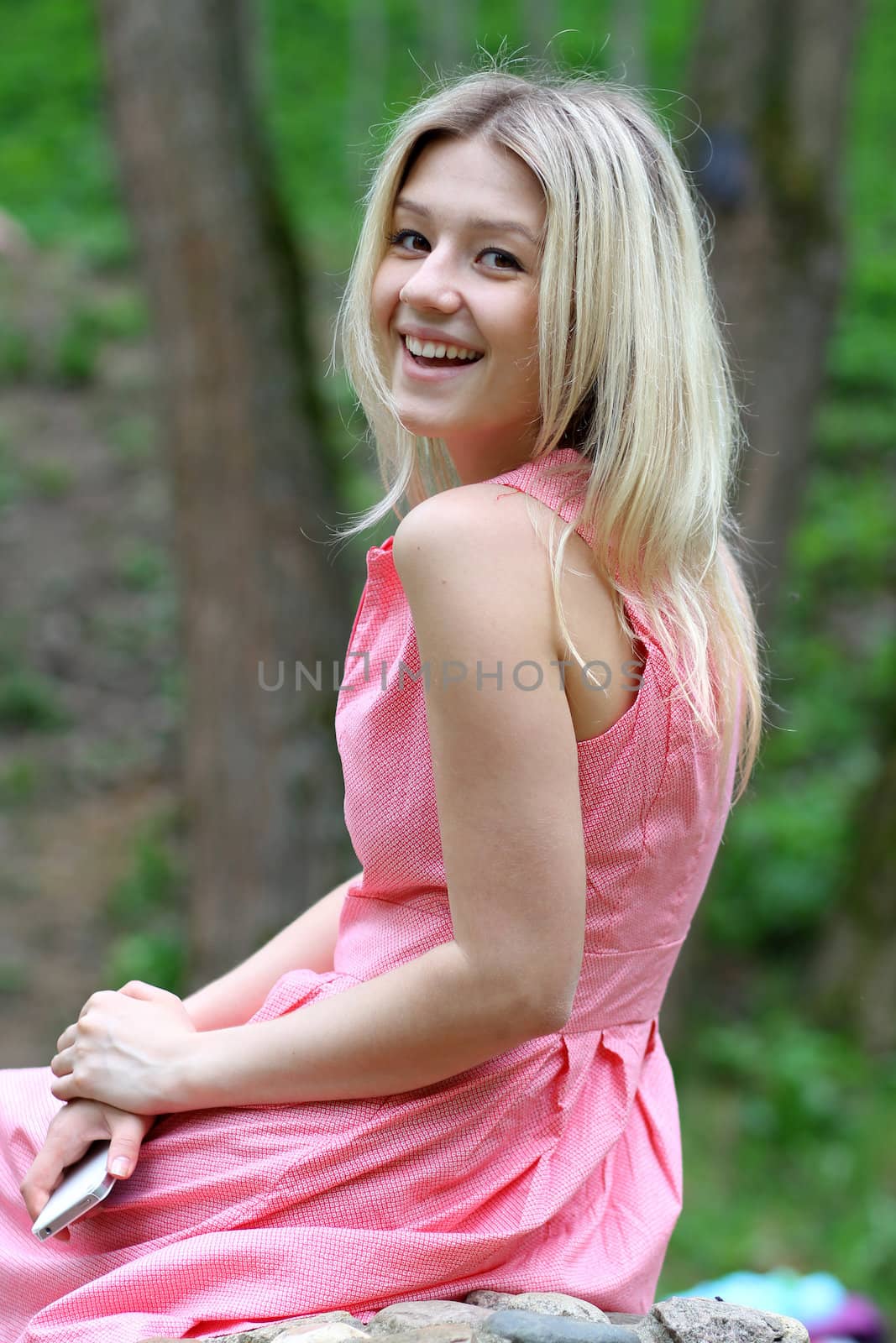 Beautiful young girl in pink dress
