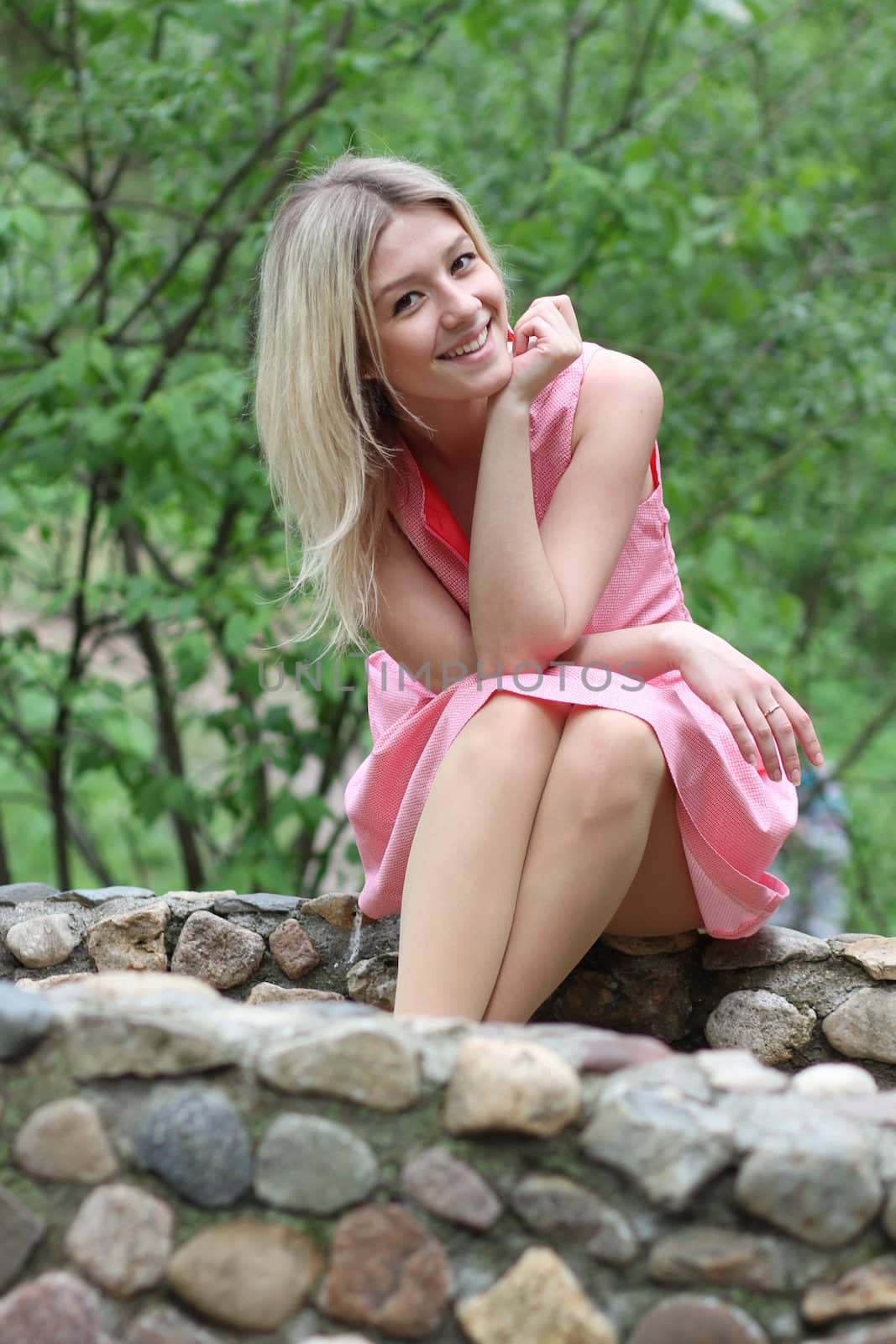 Beautiful young girl in pink dress