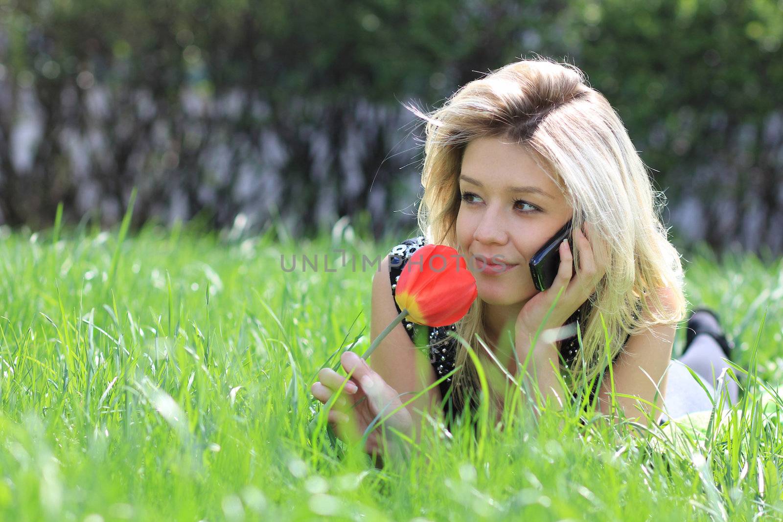 portrait of young woman talking on mobile phone