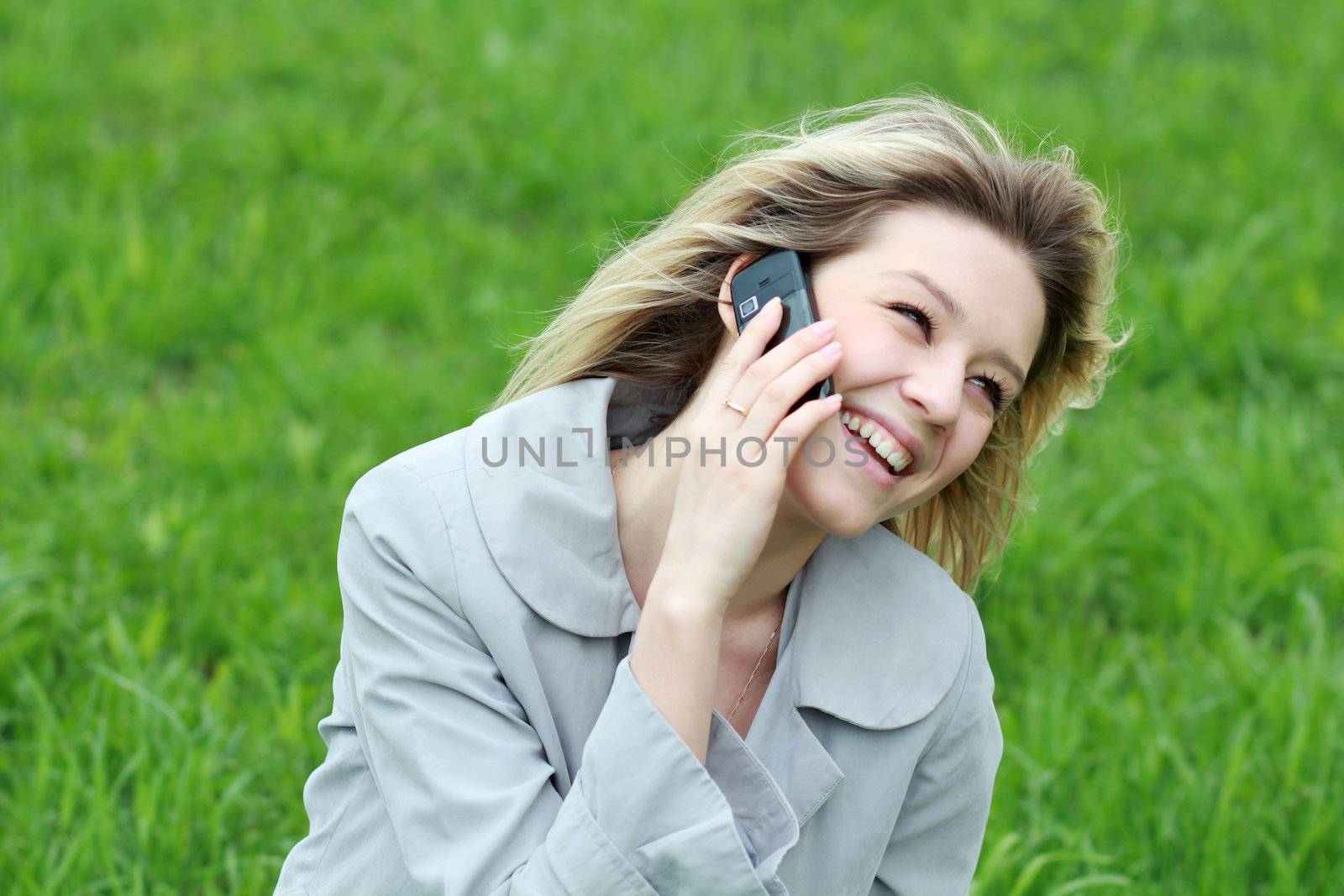 portrait of young woman talking on mobile phone
