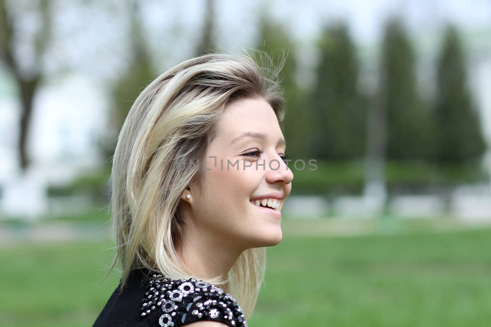 Beautiful young girl smiling. Outdoor portrait