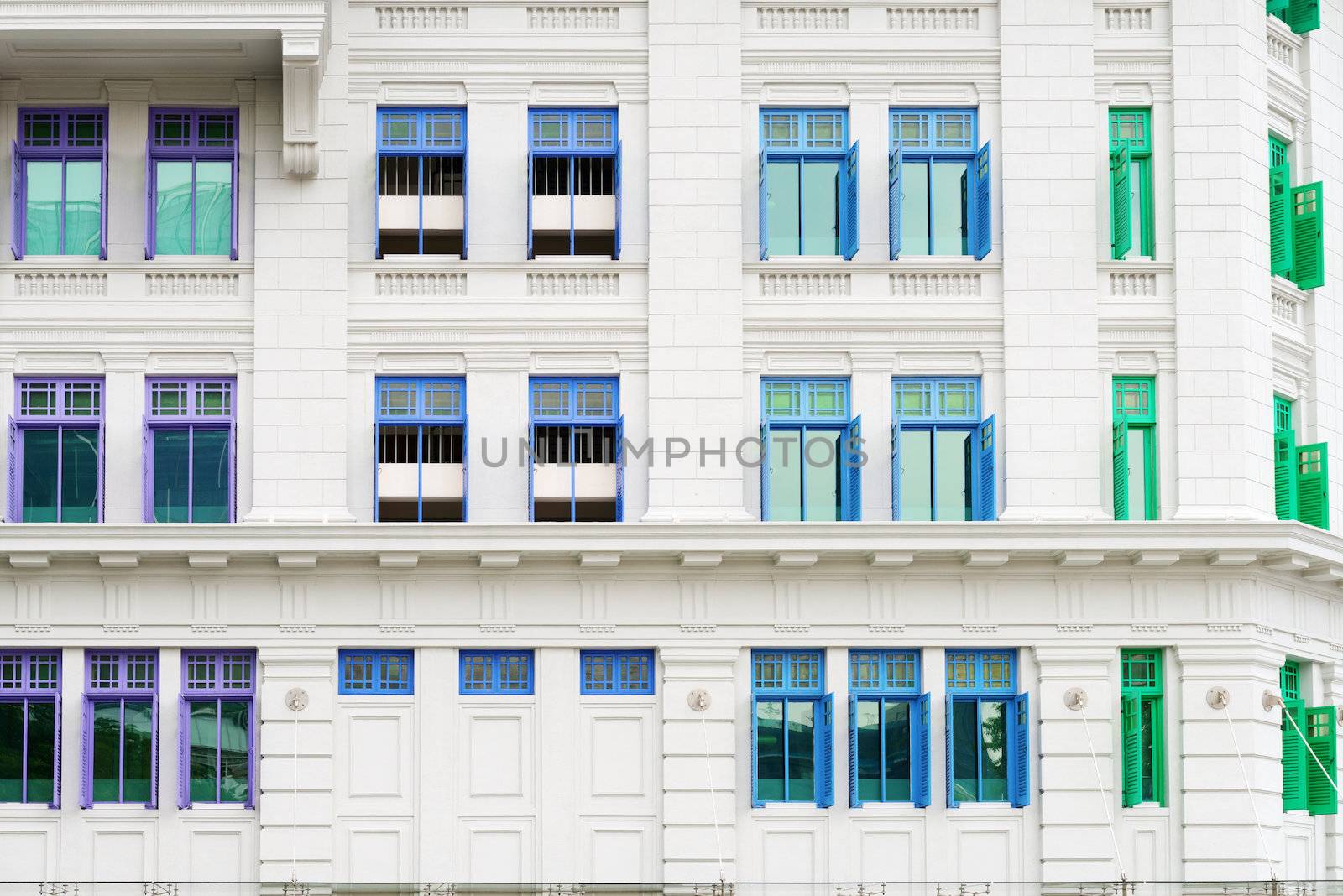 Retro windows with shutters in colonial architecture style building, Singapore
