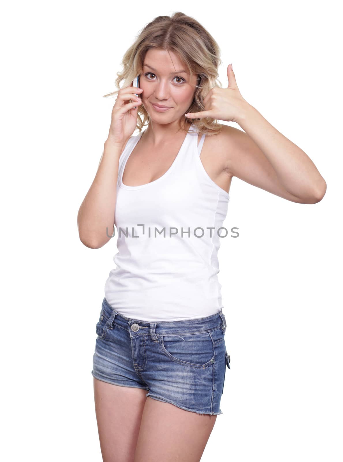 Young beautiful woman talking on cell phone