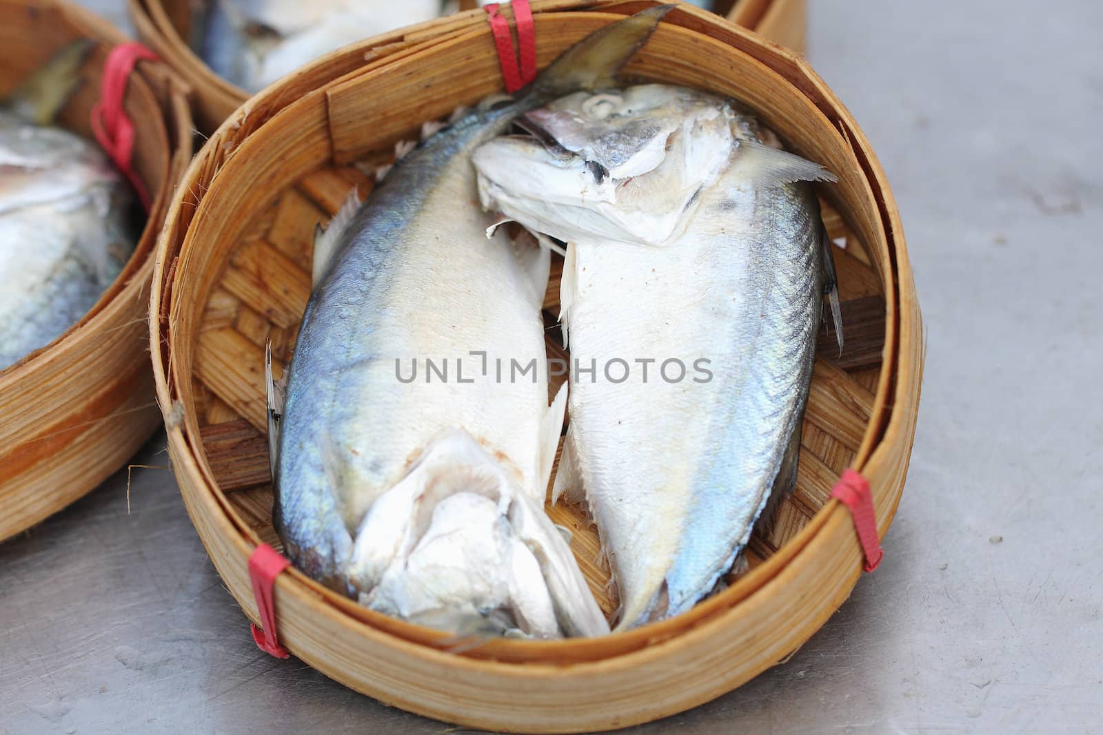 Fish for sale in a basket by myrainjom01