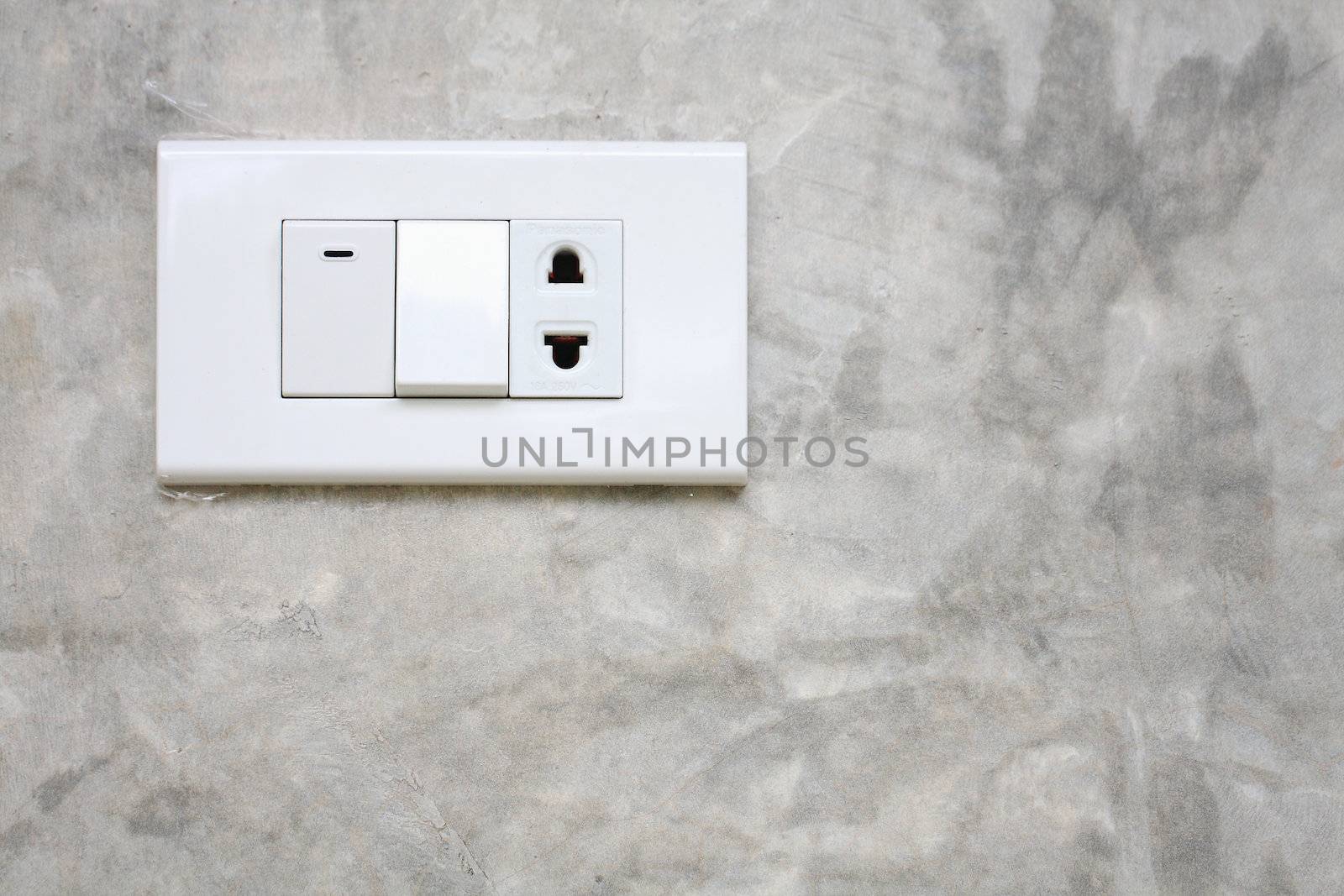 Light switch on the wall cement by myrainjom01