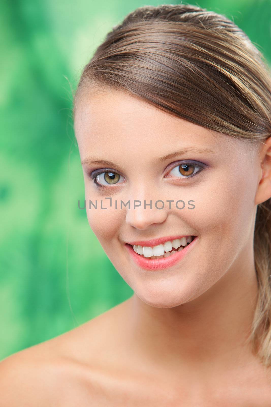 Close-up, beauty portrait of a smiling beautiful young woman