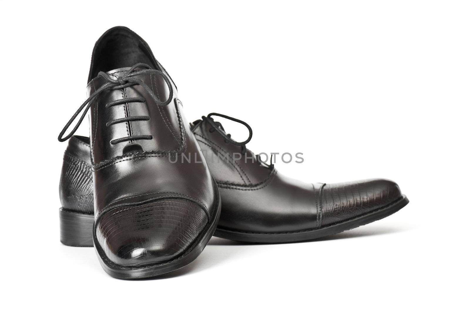 Close-up of elegant mens shoes on white background