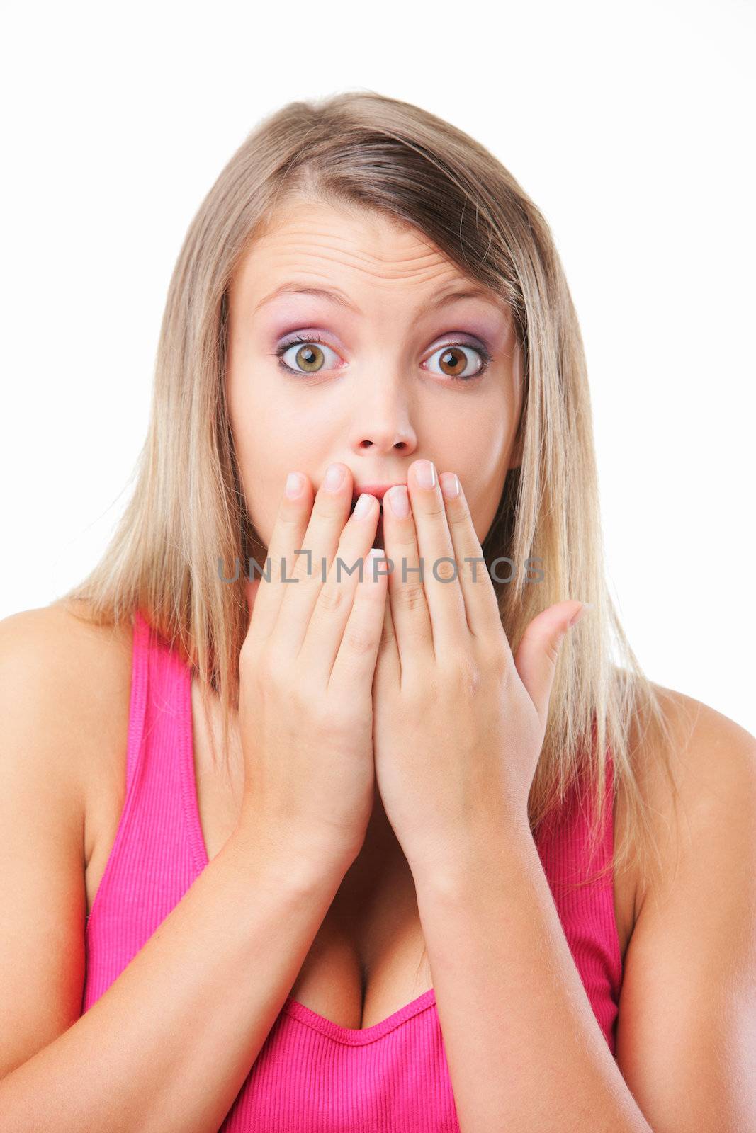 Close up portrait of a shocked girl on white background