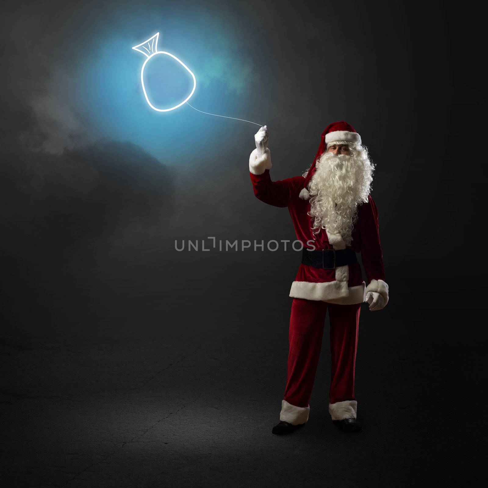 Santa Claus is holding a shining bag by adam121