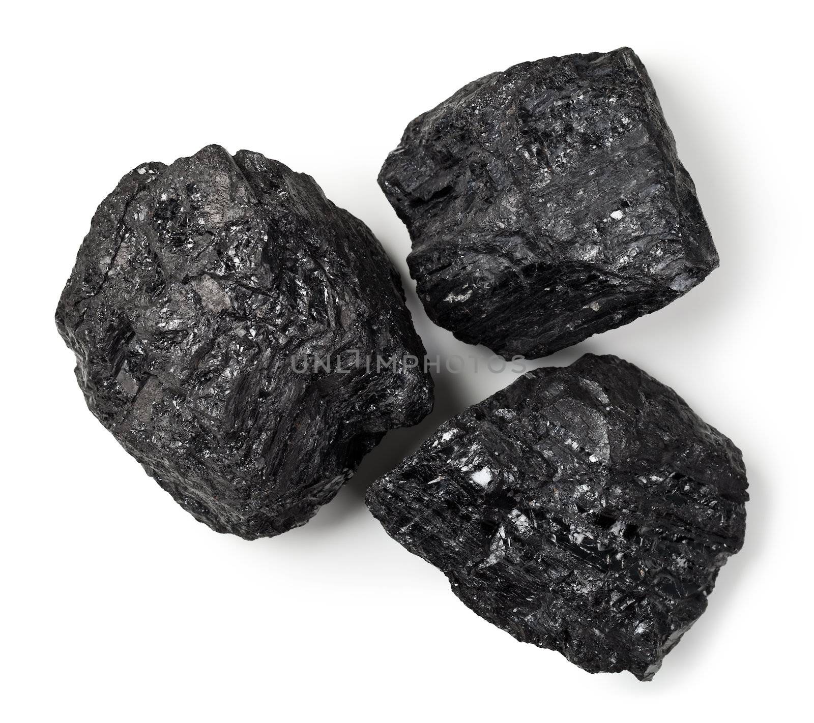 Coal lumps on white background. Top view