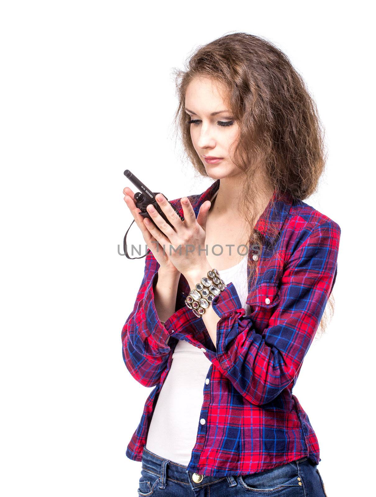 Attractive young woman in a checkered shirt with walkie talkie, by gsdonlin