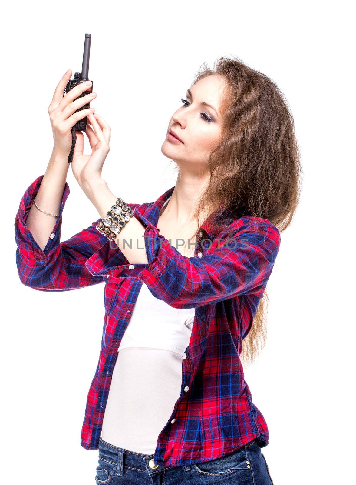 Attractive young woman in a checkered shirt with walkie talkie, by gsdonlin
