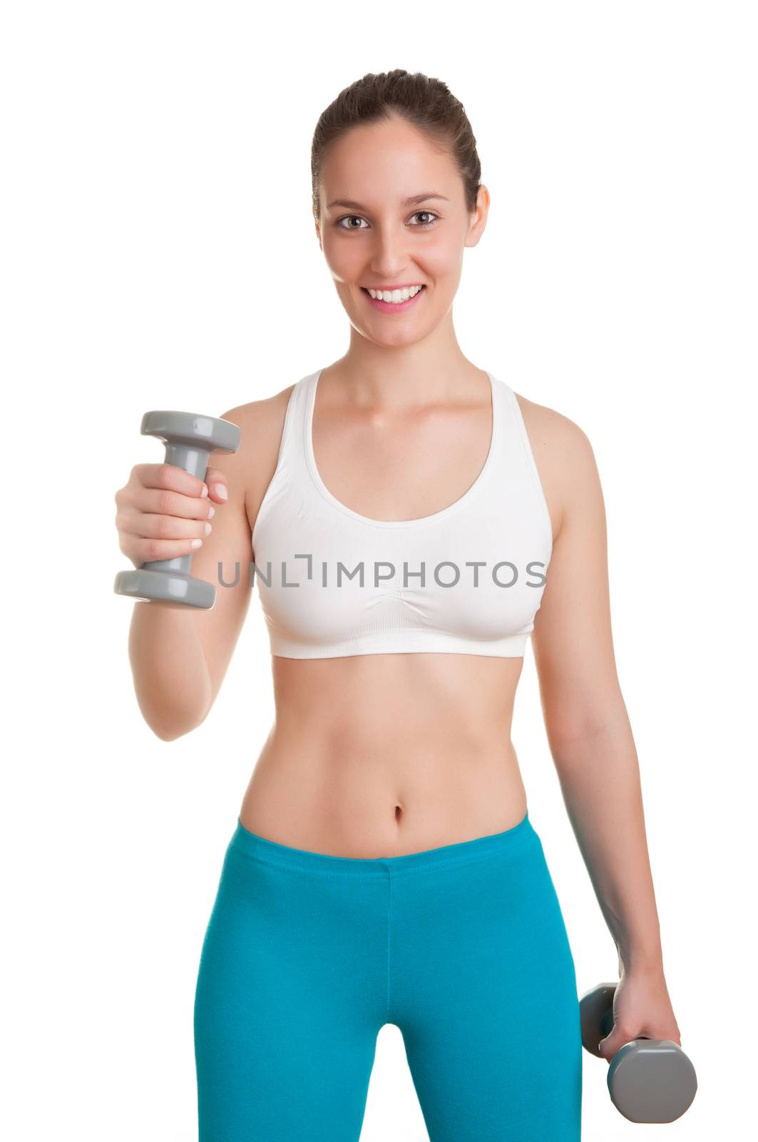 Woman working out with dumbbells at a gym