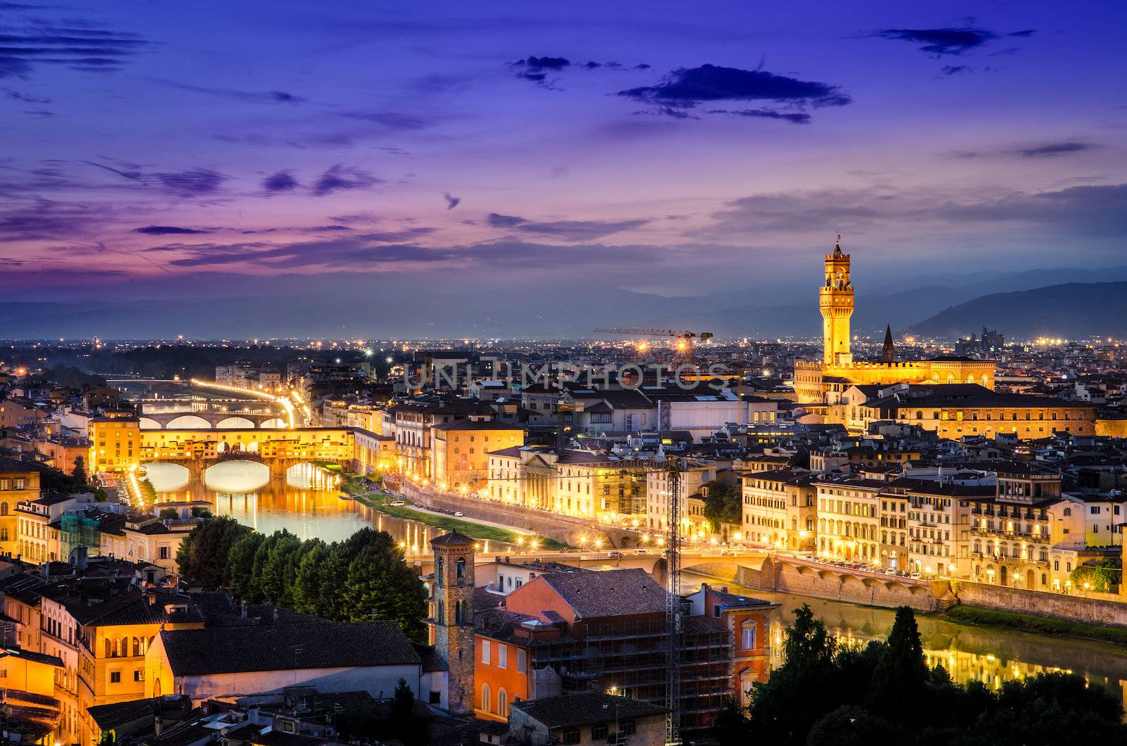 Scenic night view of Florence with Ponte Vechio and Palace, Italy