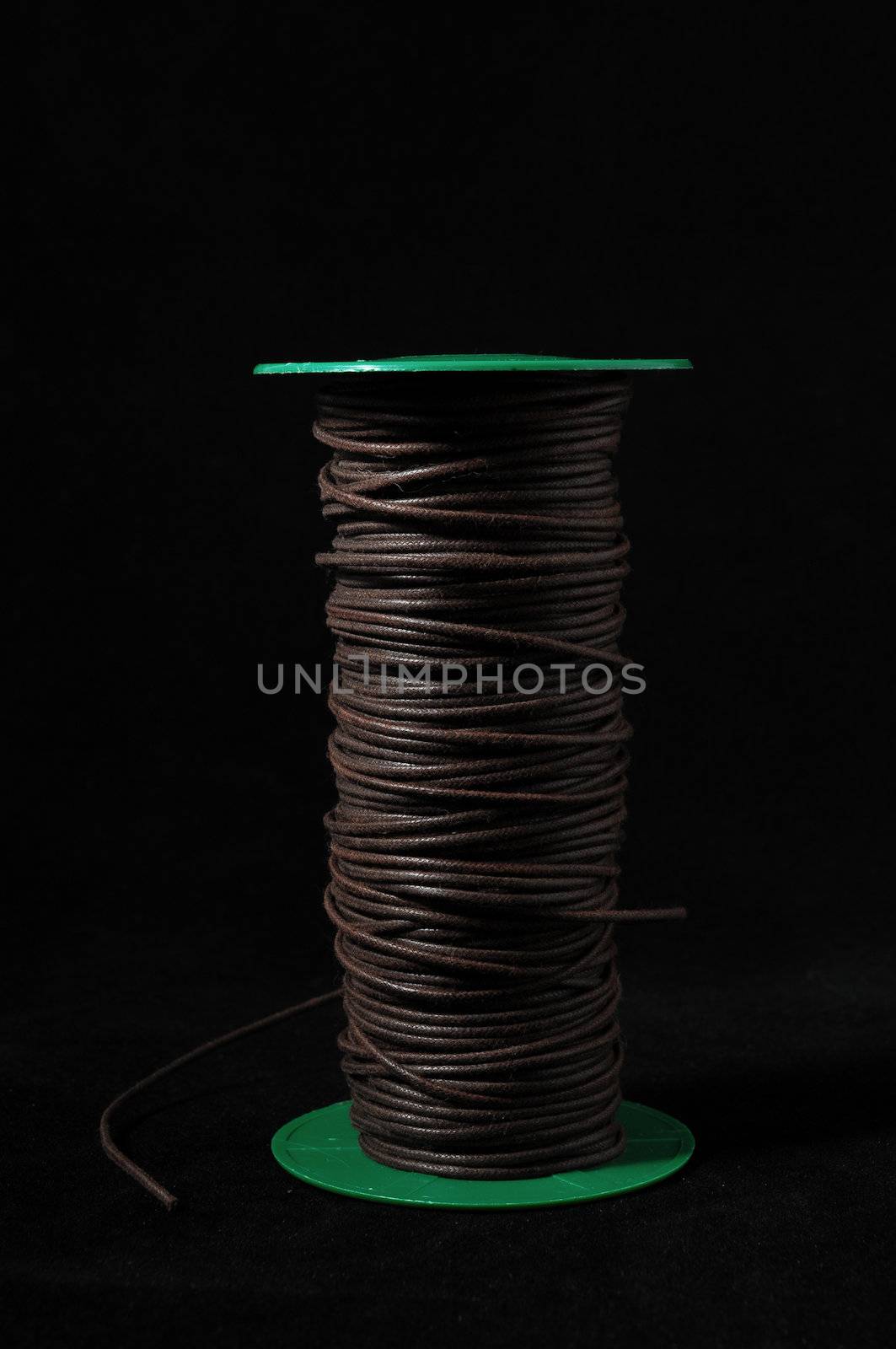 Roll of Twine isolated on a Black Background