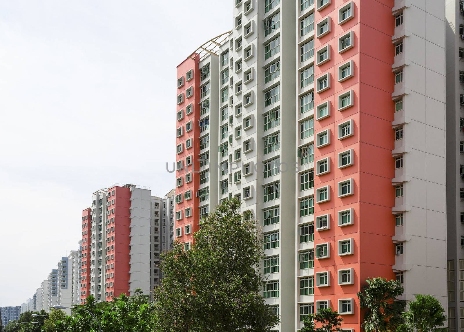 A row of red color housing apartment.