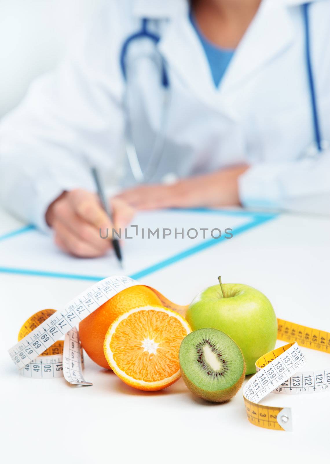 Nutritionist Doctor is writing a prescription. Focus on fruit