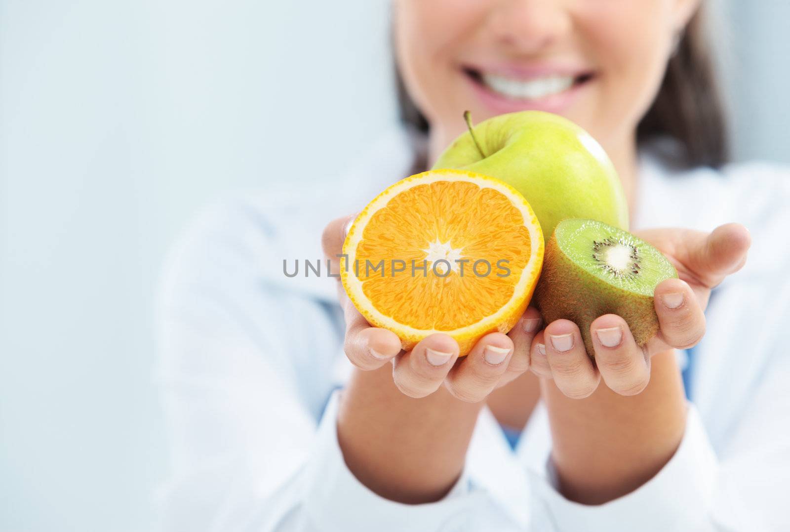 Doctor Nutritionist with Fruit in her hands