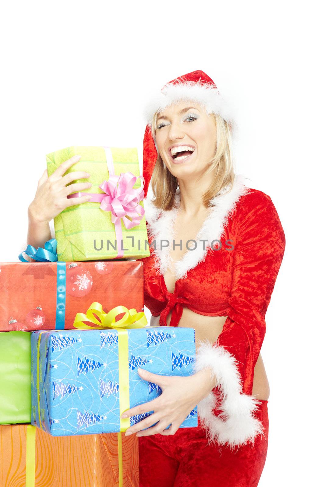 Smiling lady in Santa Claus costume with Christmas gift boxes