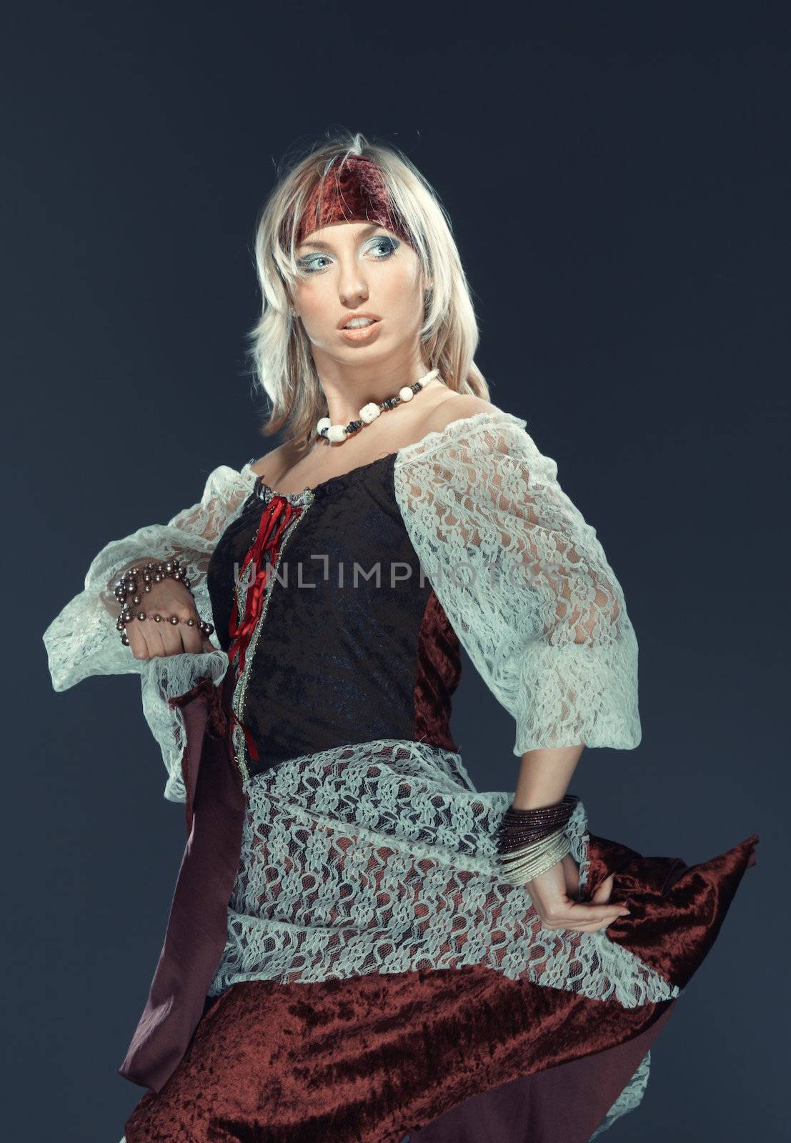 Female flamenco dancer on a studio background