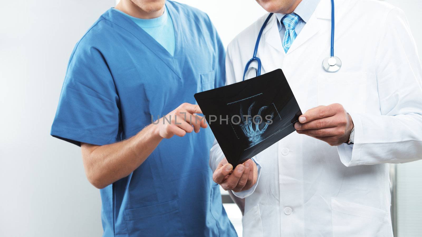 Doctor and nurse looking at x ray
