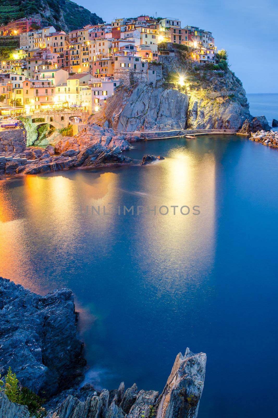 Night view of colorful village Manarola, Cinque Terre by martinm303