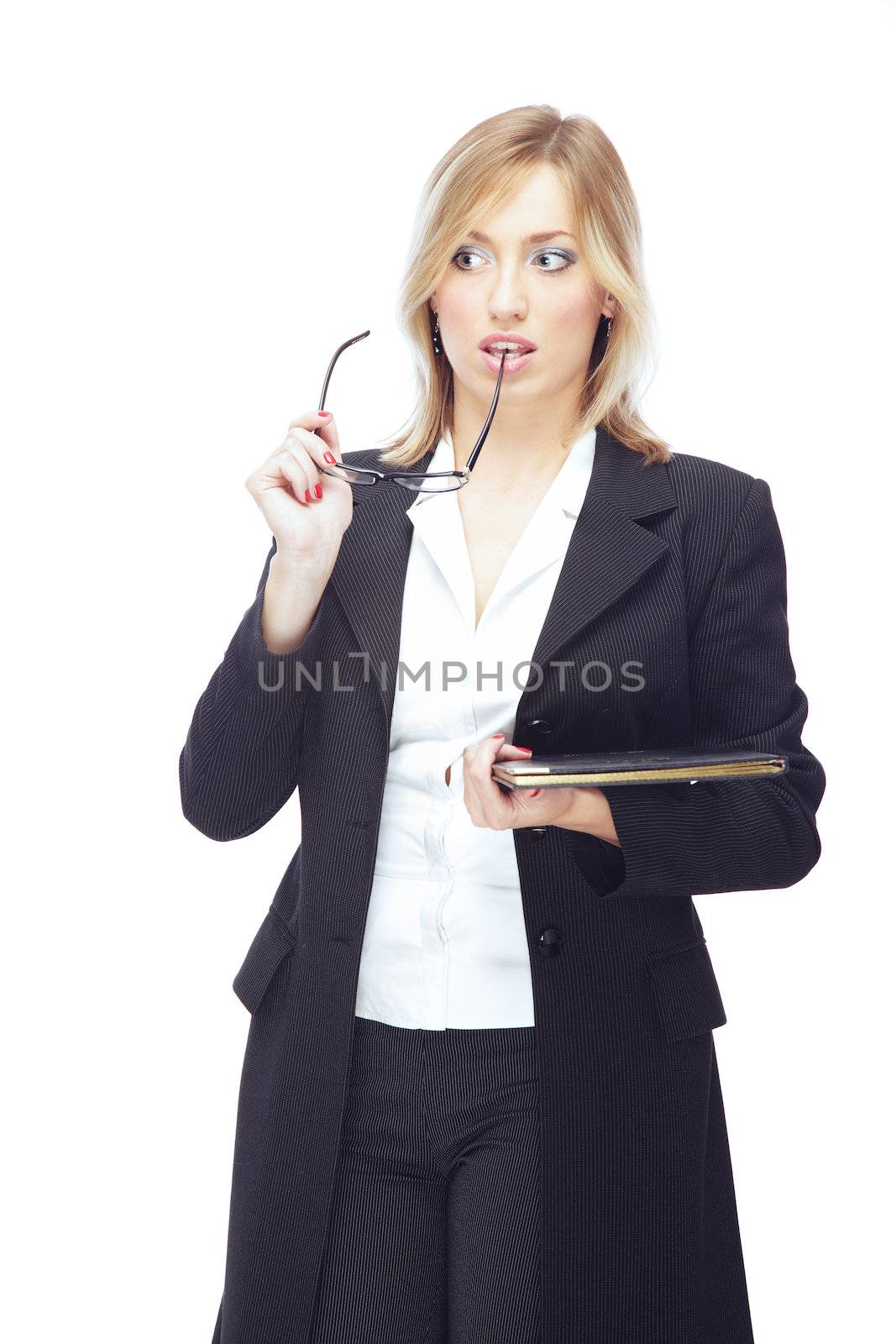 Thinking lady in business clothes holding glasses and document