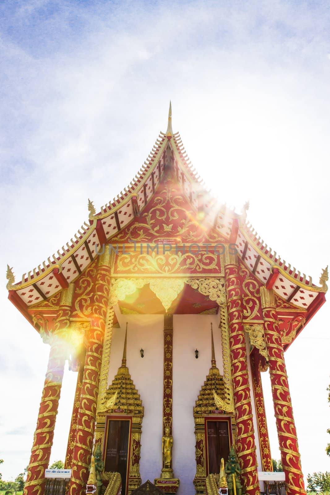 The Thai temple art of the faith and blue sky in Thailand by photo2life