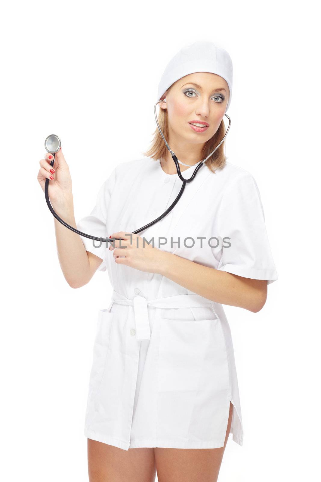 Sexy doctor in short dress holding stethoscope