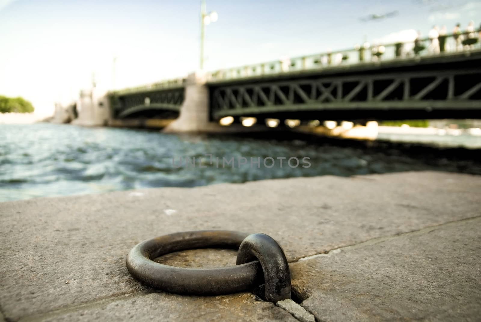 Mooring ring on stone embankment of the Neva river. St. Petersburg.