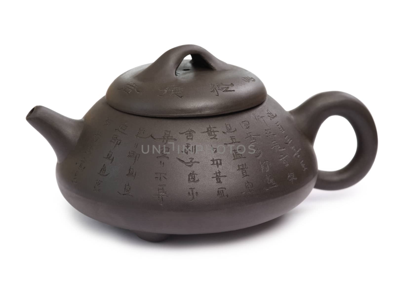 Photo of an isolated black ceramic Chinese teapot.
